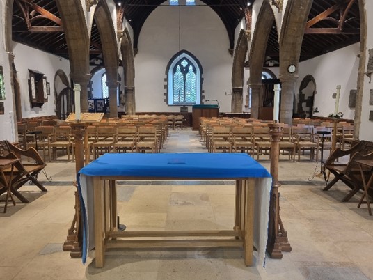 The new altar in position and the new chairs