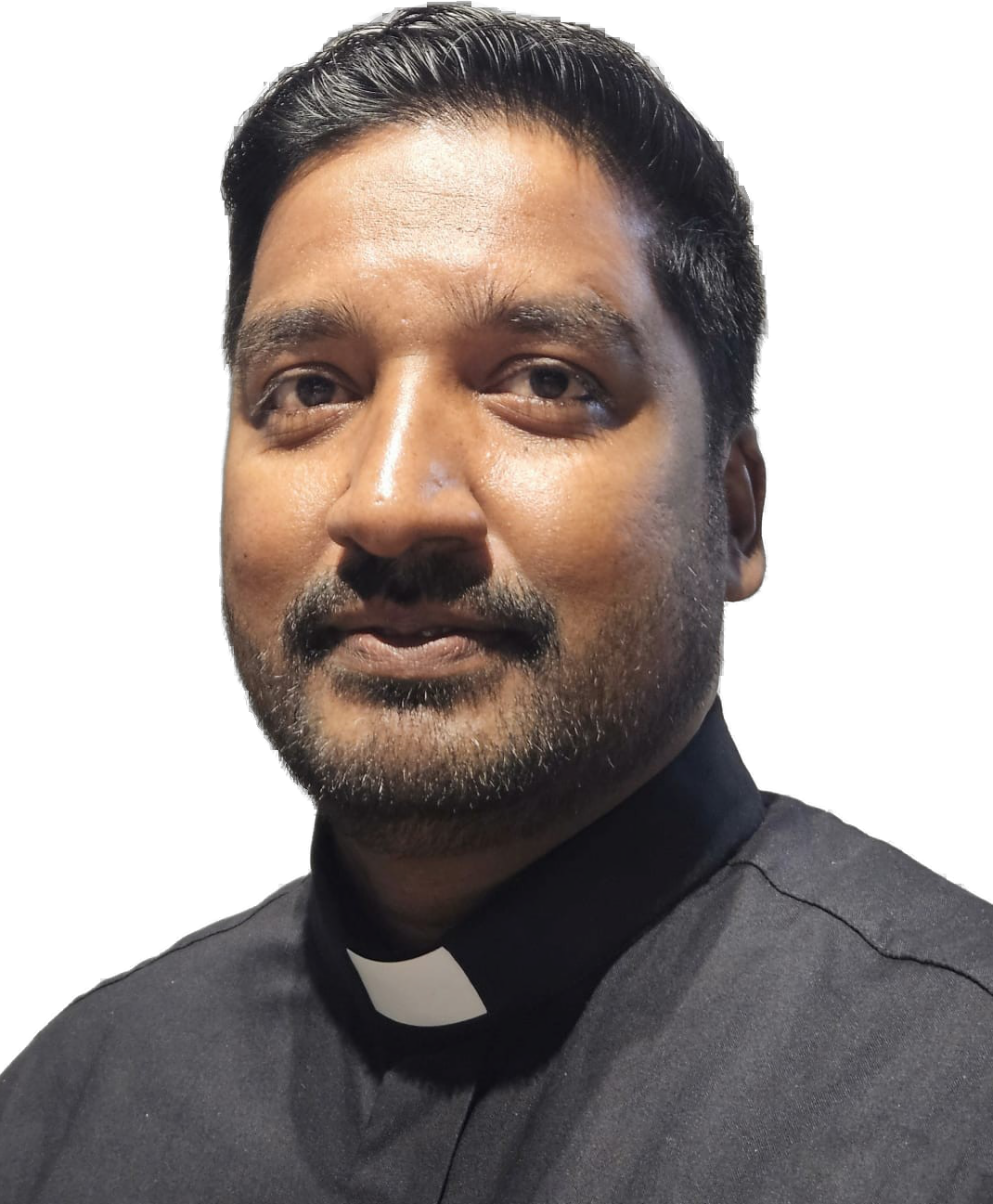 Rev Saji Dominic